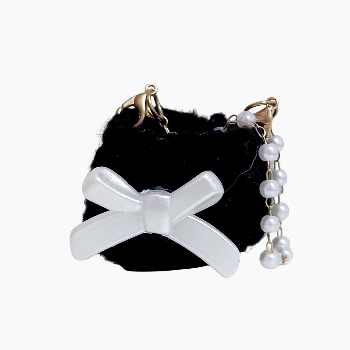 BAG WITH CHARM